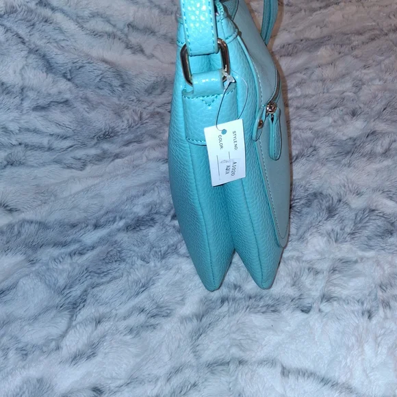 Elegant Teal Crossbody Bag with Structured Design - Picture 3 of 11